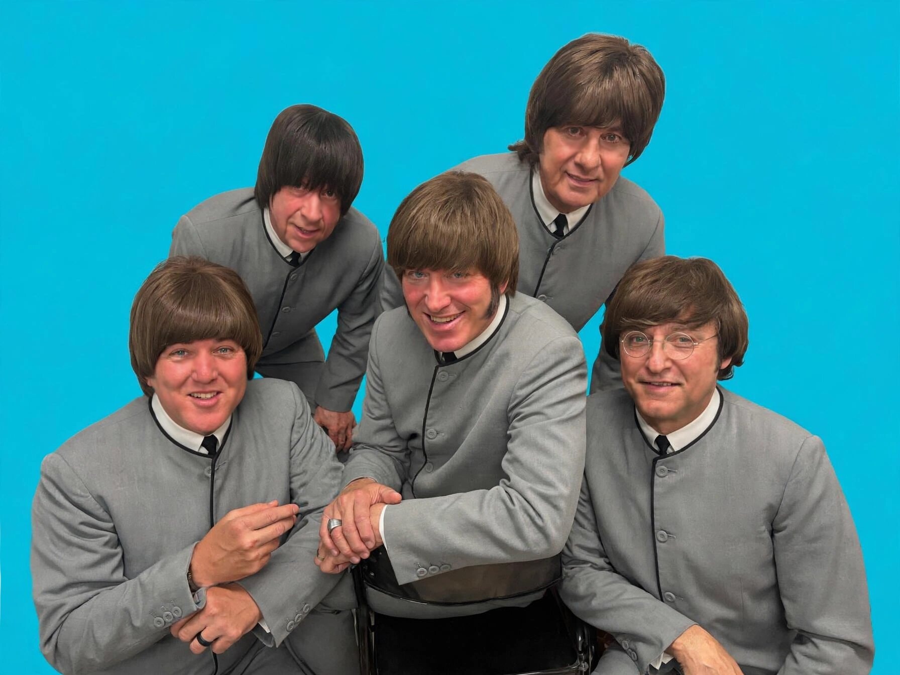 The Fab 5 in grey collarless suits against turquoise background