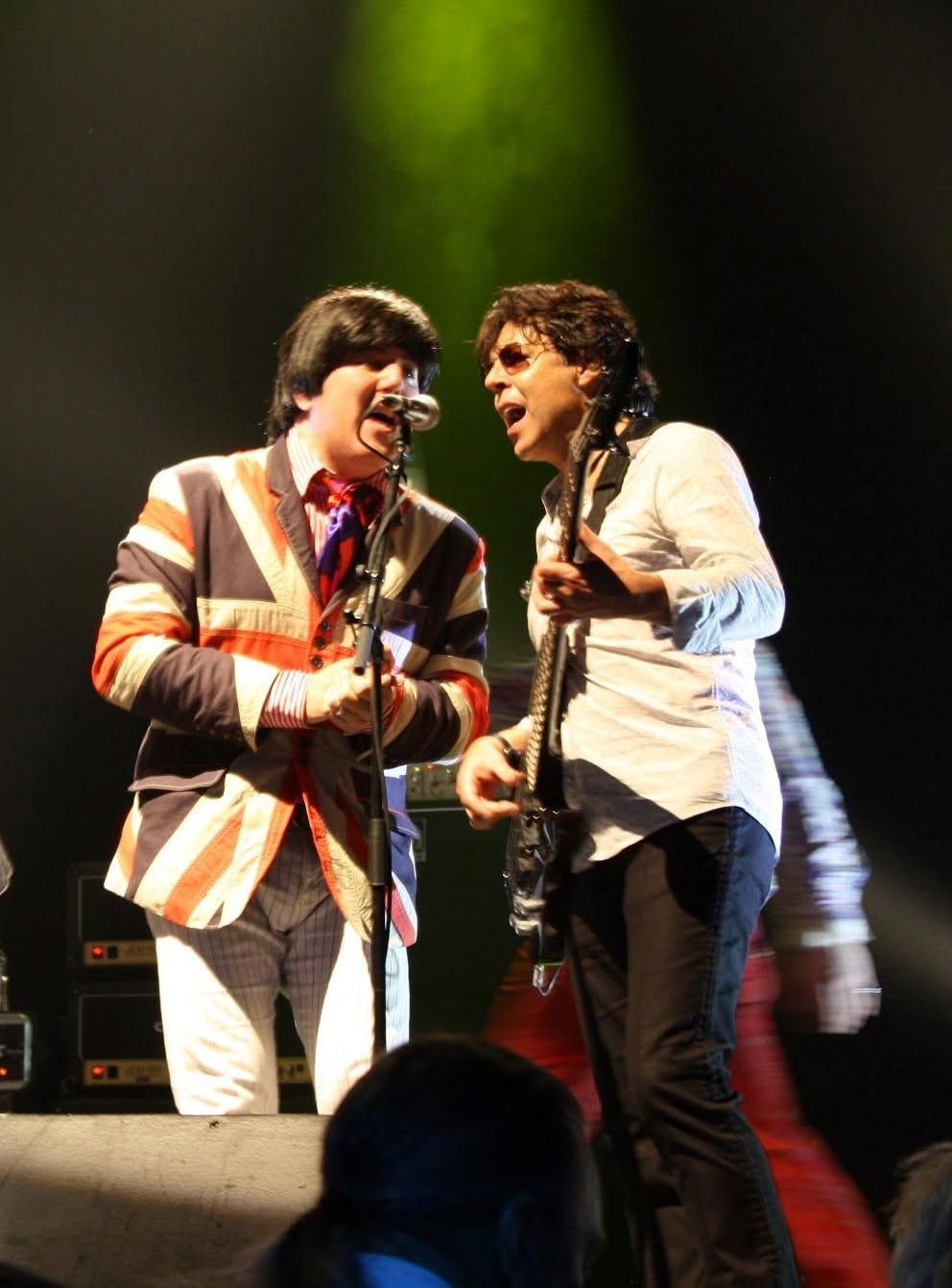 Two Fab 5 musicians performing together on stage